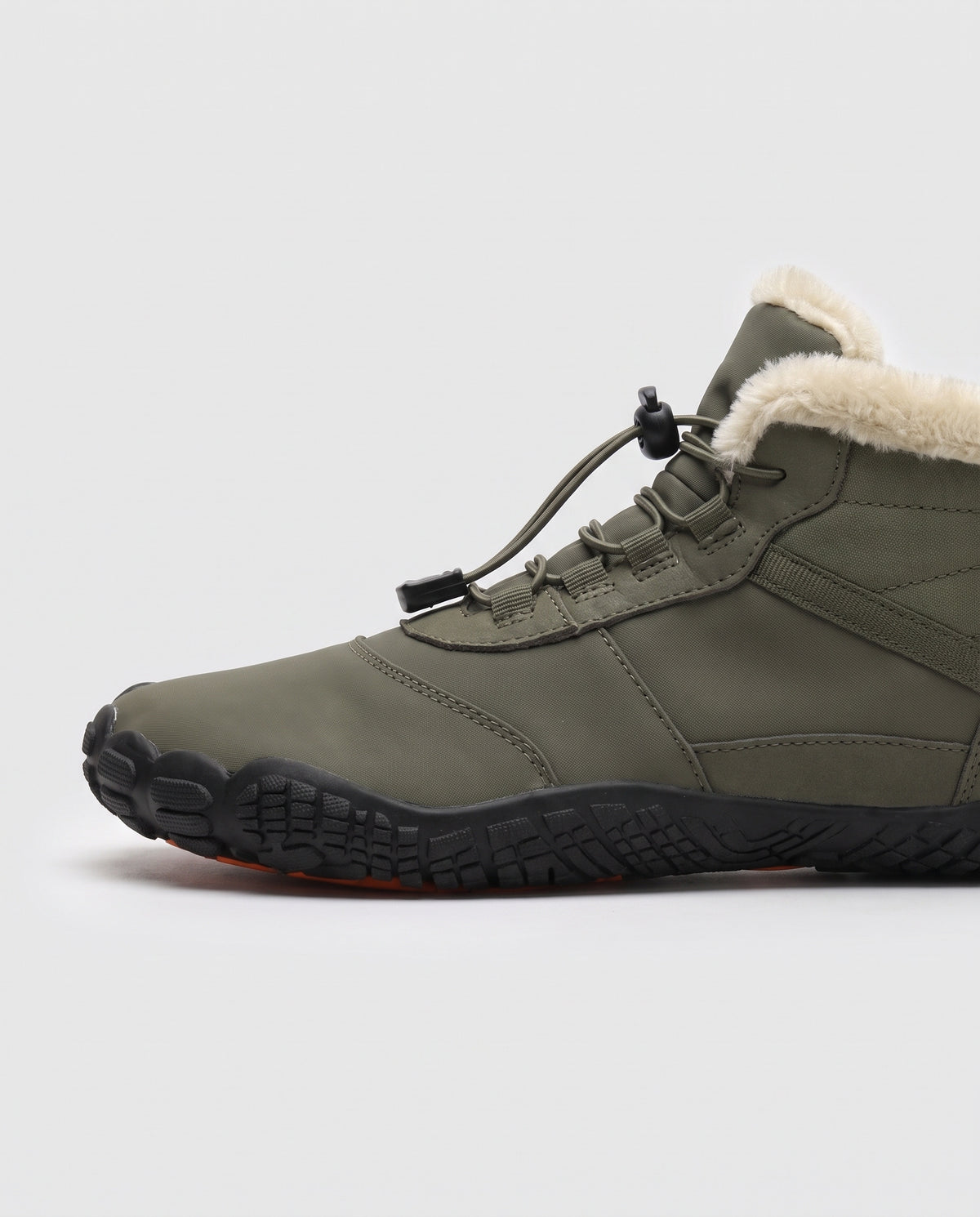 De dunne zool van de Snowline Frost naast een dikke wandelzool
